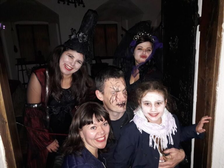 From Brasov: Halloween Party at Bran Castle - Welcome at Bran: Red Wine, Palinca, Snacks, and Group Time